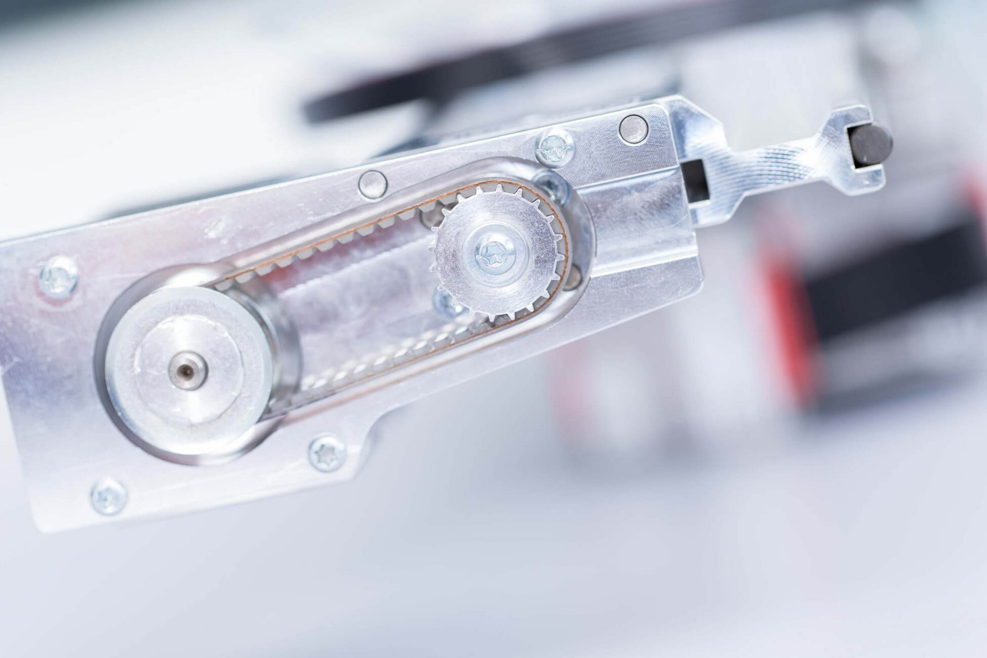 Close-up of a metallic mechanical component in a lab automation system, similar to parts used in PAL Systems.”
