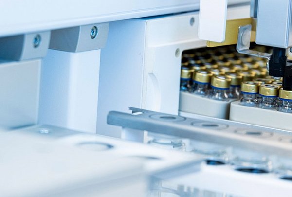 Lab automation handling sample vials, highlighting PAL Solutions expertise featured in our About Us content