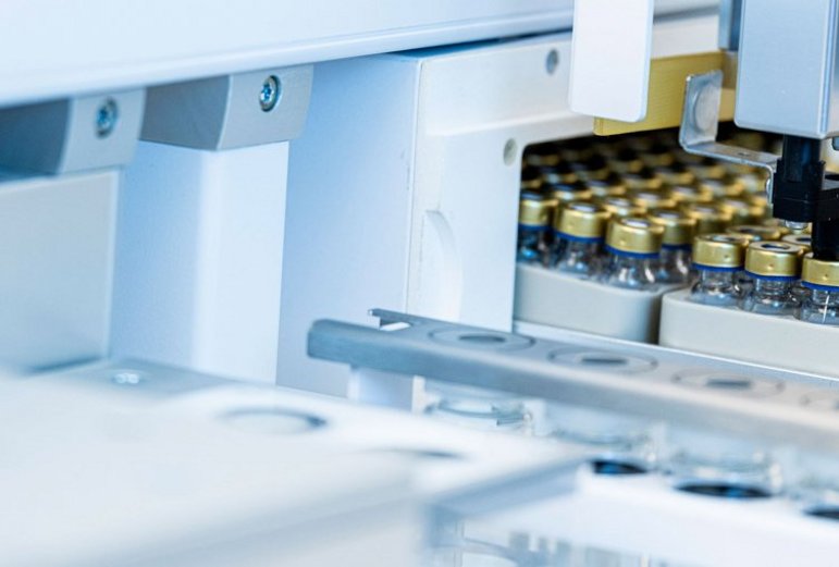 Lab automation handling sample vials, highlighting PAL Solutions expertise featured in our About Us content